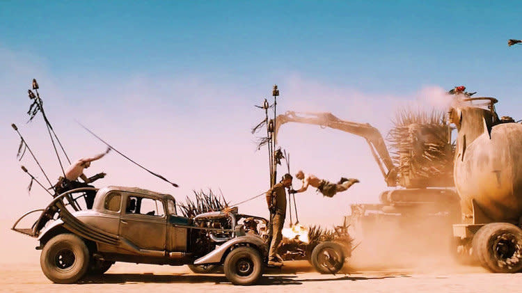 With spectacular car chases set against rolling deserts, the vivid earth tones in "Mad Max: Fury Road" make every scene look practically like a painting. (Photo: Warner Bros. Pictures)