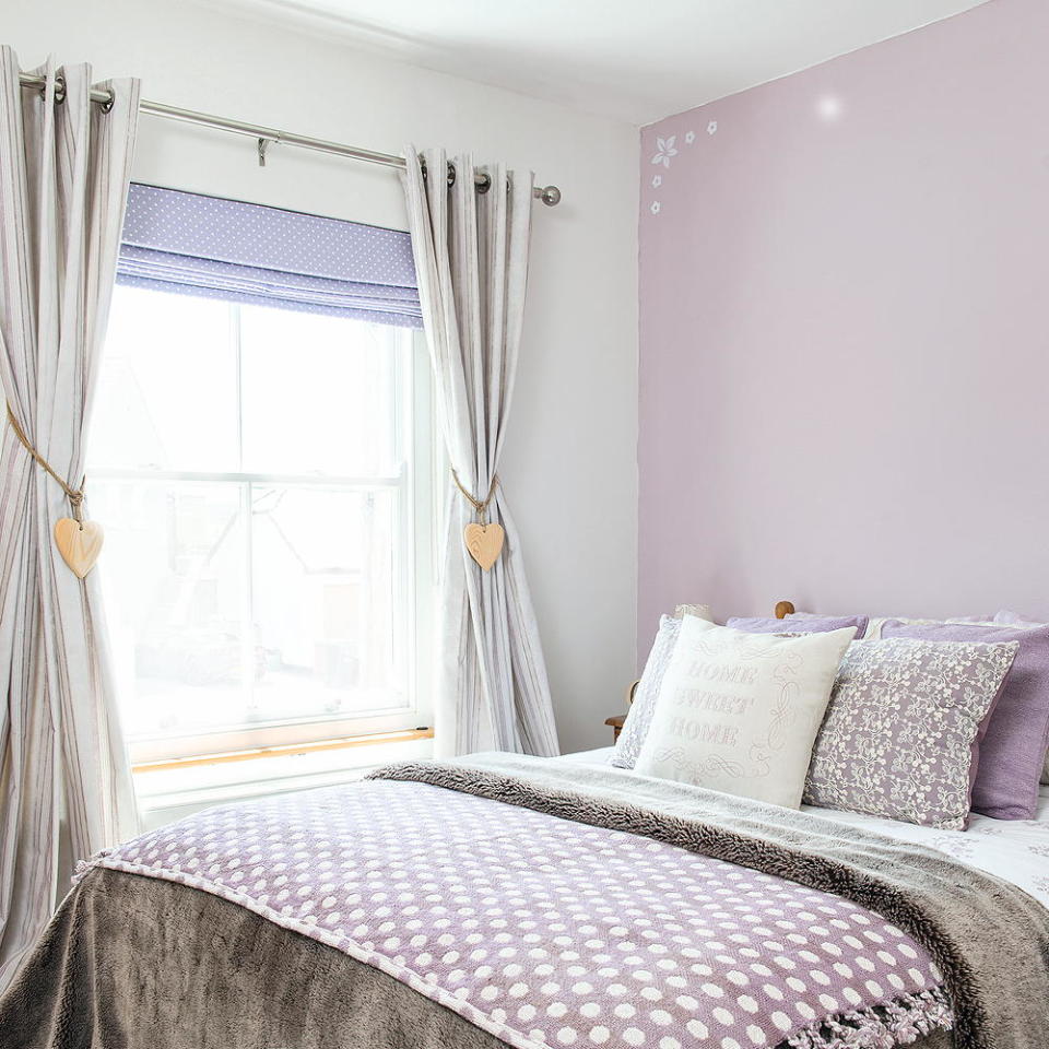 bedroom with white and pink walls