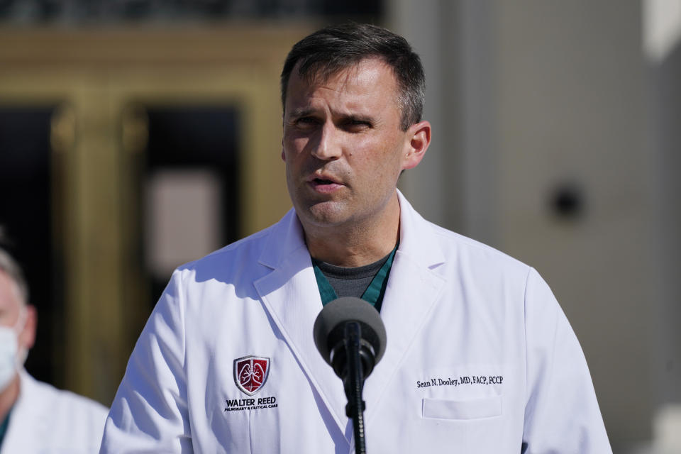 Dr. Sean Dooley, talks with reporters at Walter Reed National Military Medical Center, Monday, Oct. 5, 2020, in Bethesda, Md. (AP Photo/Evan Vucci)