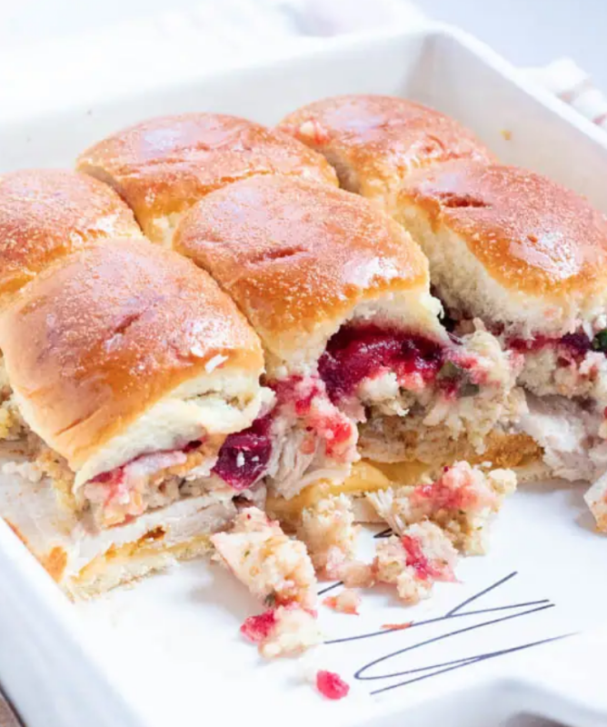 <p>Fox and Briar</p><p>Thanksgiving leftover sliders are the perfect way to use your thanksgiving leftovers! Use your leftover turkey, stuffing and cranberry sauce in these cute and delicious sliders!</p><p><strong>Get the recipe: <a href="https://www.foxandbriar.com/thanksgiving-leftover-turkey-sliders/" rel="nofollow noopener" target="_blank" data-ylk="slk:Thanksgiving Leftover Sliders;elm:context_link;itc:0;sec:content-canvas" class="link rapid-noclick-resp">Thanksgiving Leftover Sliders</a></strong></p><p><strong>Related: <a href="https://parade.com/1155116/felicialim/sheet-pan-slider-recipes/" rel="nofollow noopener" target="_blank" data-ylk="slk:Simple Sheet Pan Sliders for No-Fuss Yum on Game Day;elm:context_link;itc:0;sec:content-canvas" class="link rapid-noclick-resp">Simple Sheet Pan Sliders for No-Fuss Yum on Game Day</a></strong></p>