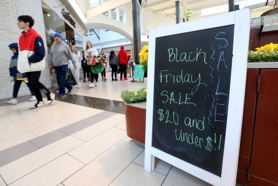 Shoppers look for deals on Black Friday on Nov. 25, 2022, at University Park Mall in Mishawaka.