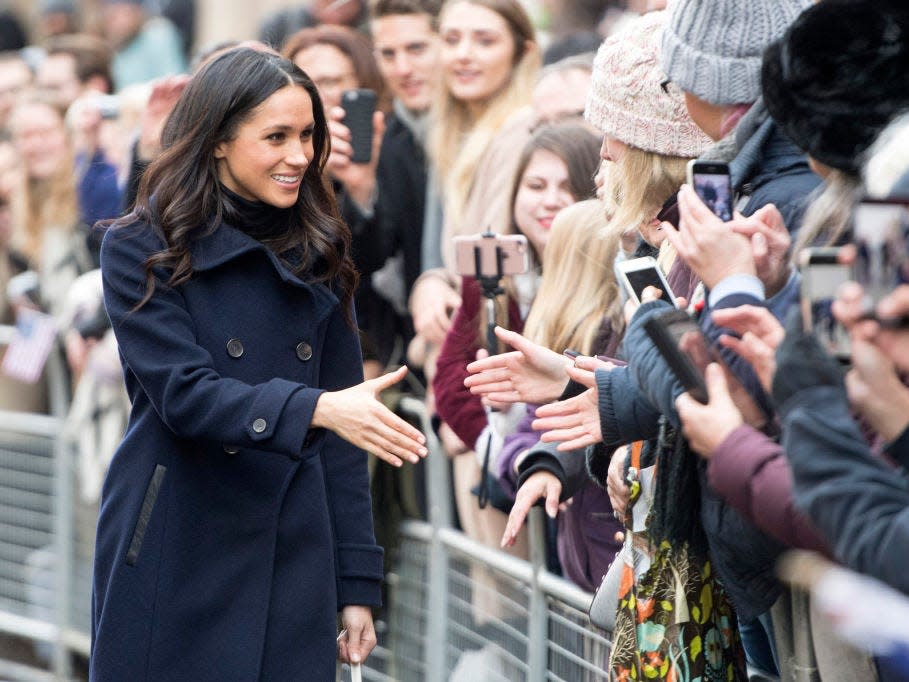 Meghan Markle shakes hands with members of the public