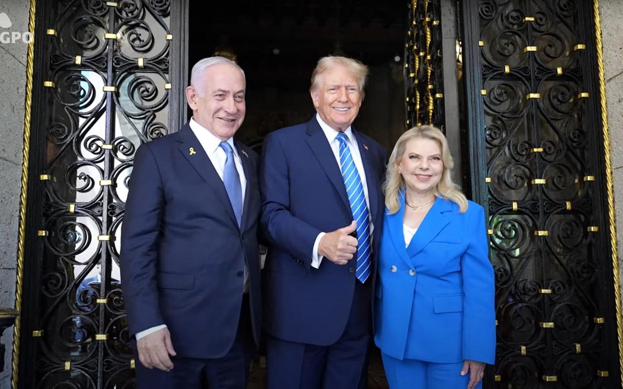 Israeli Prime Minister Benjamin Netanyahu and his wife Sara (are welcomed by Donald Trump at the Mar-a-Lago Club in West Palm Beach