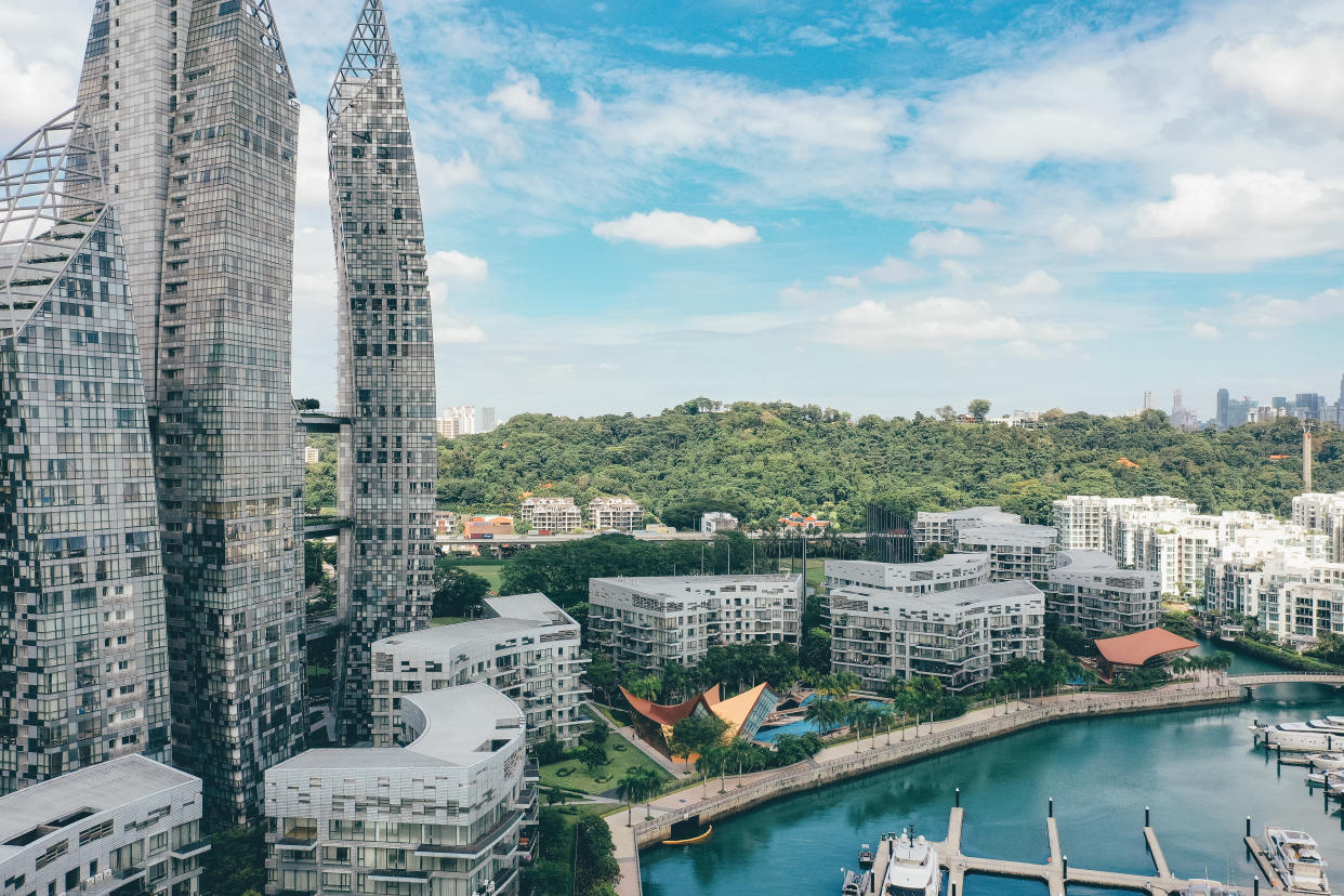 Modern and luxury smart homes in Singapore, seen from above during a hot summer day at the Keppel Bay Yacht Marina area in the city centre.