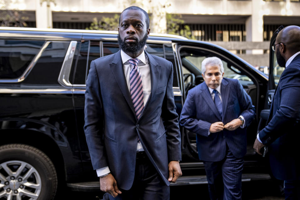 Image: Prakazrel “Pras” Michel arrives at federal court for his trial in an alleged campaign finance conspiracy (Andrew Harnik / AP)