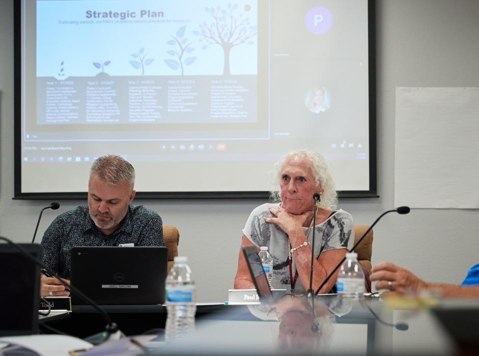 Paul Bixler listens to and asks questions during a meeting of the Liberty Elementary School Board in the Jerry Rovey District Facility building in Buckeye on June 20, 2022.