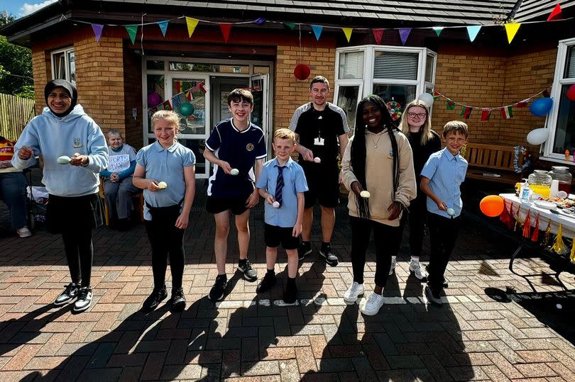 Pupils went head-to-head with residents in sports day classics