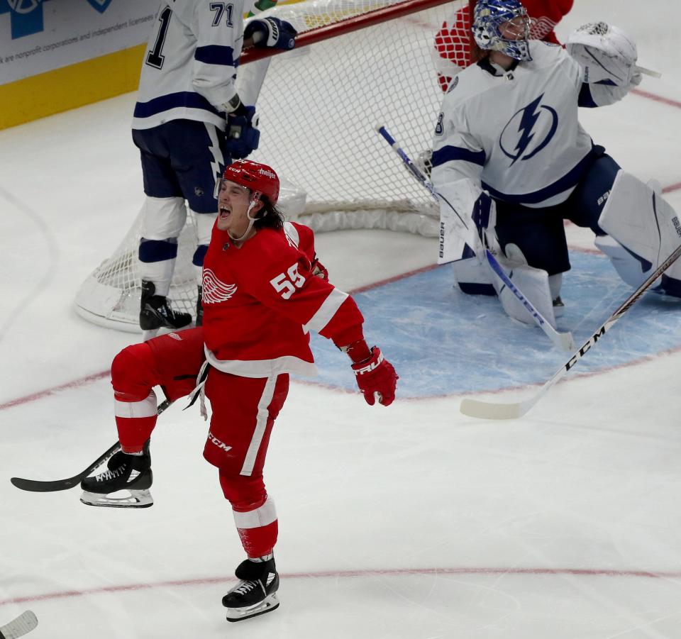 Detroit Red Wings left wing Tyler Bertuzzi (59) celebrates after his fourth goal against the Tampa Bay Lightning during third-period action of the season opener at Little Caesars Arena Thursday, Oct. 14, 2021.