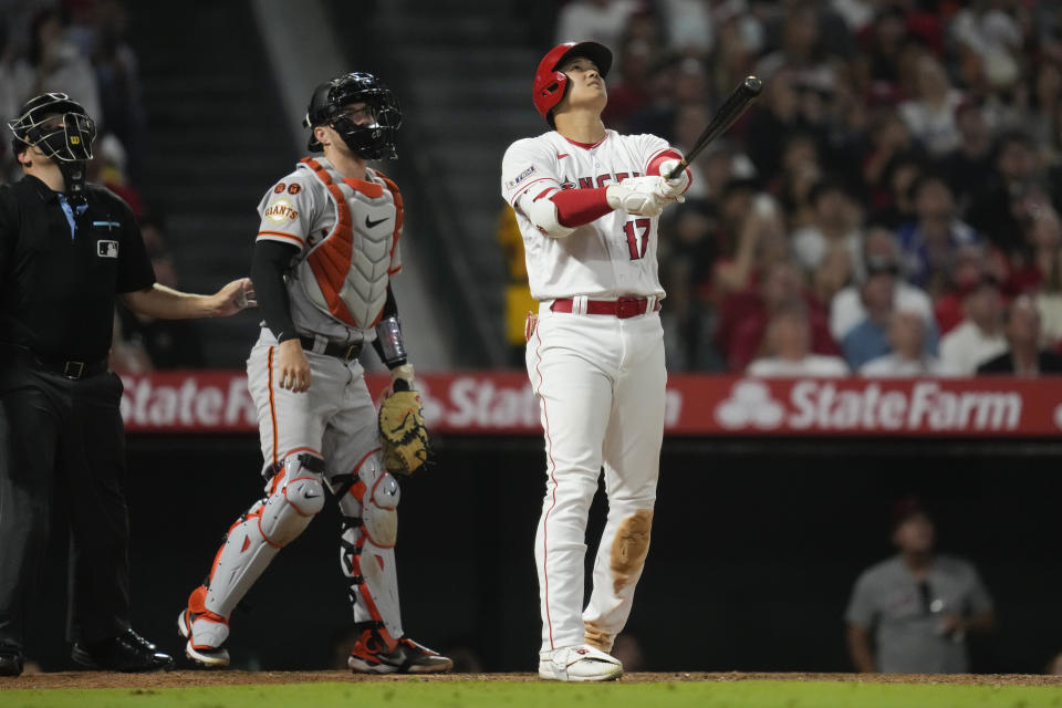 Los Angeles Angels designated hitter Shohei Ohtani (17) flies out during the seventh inning of a baseball game against the San Francisco Giants in Anaheim, Calif., Monday, Aug. 7, 2023. (AP Photo/Ashley Landis)