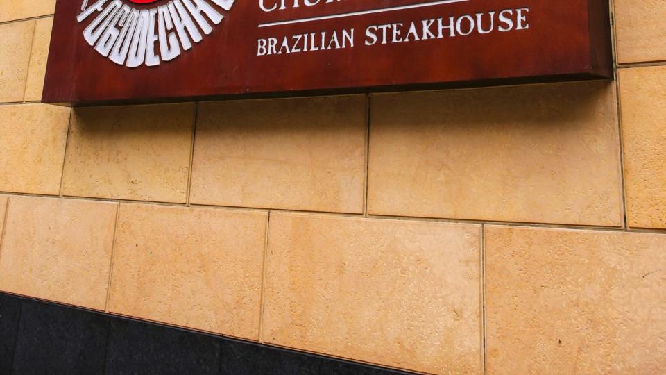 minneapolis, mn, usa july 26, 2015 fogo de chao brazillian steakhouse restaurant wall sign on s 7th street in minneapolis mn