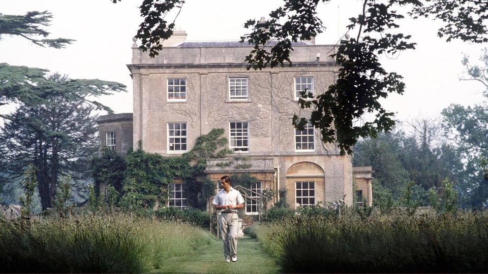 man walking in garden at highgrove 