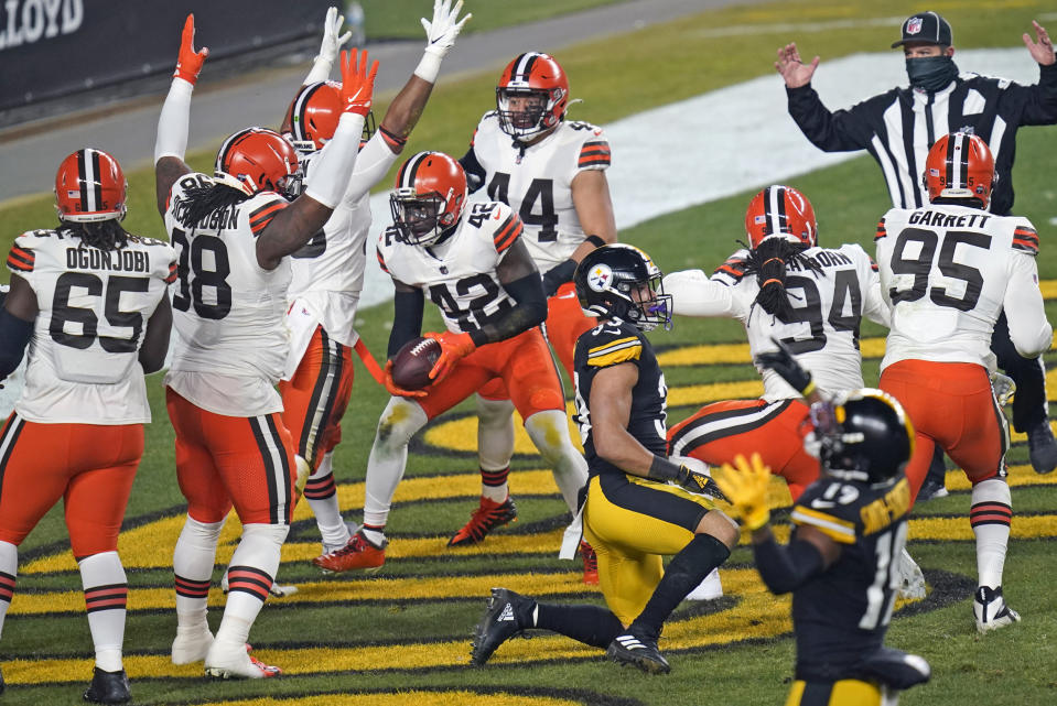 Cleveland Browns strong safety Karl Joseph (42) celebrates after recovering a fumble in the during the first half of an NFL wild-card playoff football game against the Pittsburgh Steelers, Sunday, Jan. 10, 2021, in Pittsburgh. (AP Photo/Keith Srakocic)