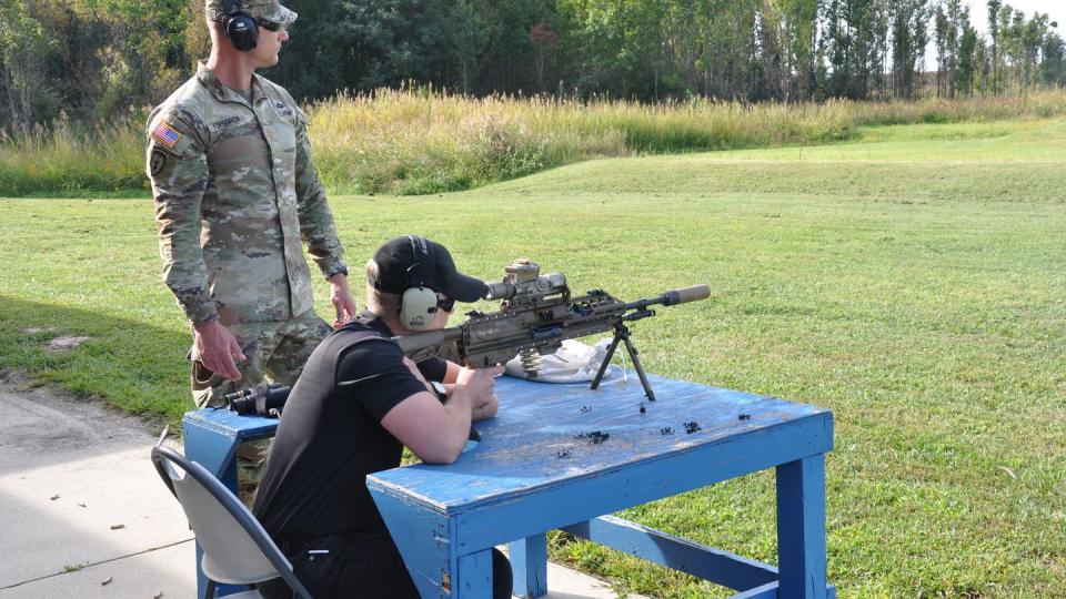 Todd South with Army Times shoots the NGSW automatic rifle at Aberdeen Proving Ground, Md., on Sept. 21, 2023. (Army)