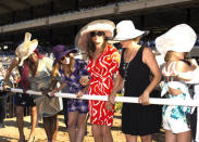 <p>Following her amazing speech at the ESPY Awards, Jenner attended Opening Day of the Del Mar Racetrack in San Diego. To take in the races, she wore a flirty DVF silk wrap dress with a ruffle hem in a red twirl pattern (<a href="http://www.dvf.com/dvf-sylvia-silk-wrap-dress/D880301U15_WRAP.html?dwvar_D880301U15__WRAP_color=GTWRD&dwvar_D880301U15__WRAP_size=0#cgid=wrap-shop-fashion" rel="nofollow noopener" target="_blank" data-ylk="slk:you can have it too for $468;elm:context_link;itc:0;sec:content-canvas" class="link ">you can have it too for $468</a>!). She accessorized with an oversized hat and round sunglasses.</p>