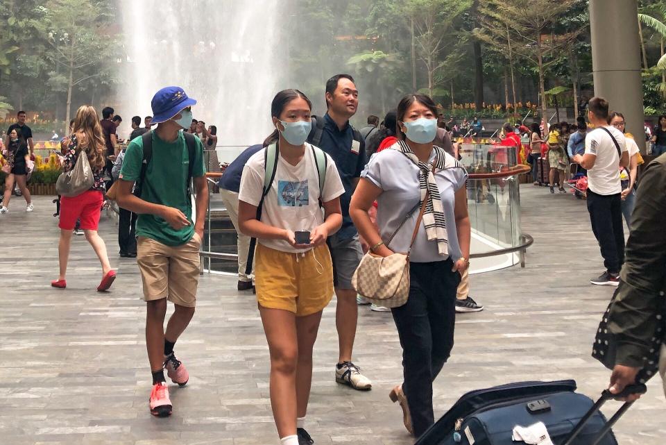 Visitors seen wearing face masks at Jewel Changi Airport on 30 January, 2020. (PHOTO: Dhany Osman/Yahoo News Singapore)