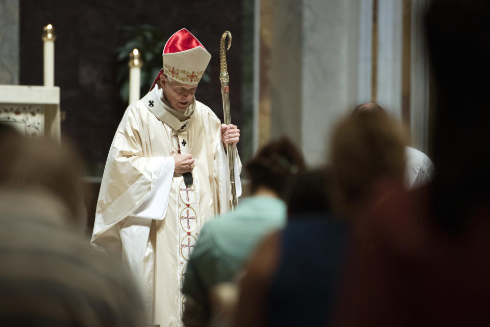 CORRECTS SPELLING OF CHURCH - FILE - In this Aug. 15, 2018 file photo, Cardinal Donald Wuerl, archbishop of Washington, celebrates Mass at St. Matthew's Cathedral in Washington. Over the past four months, Roman Catholic dioceses across the U.S. have released the names of more than 1,000 priests and others accused of sexually abusing children in an unprecedented public reckoning spurred at least in part by a shocking grand jury investigation in Pennsylvania, an Associated Press review has found. (AP Photo/Kevin Wolf, File)