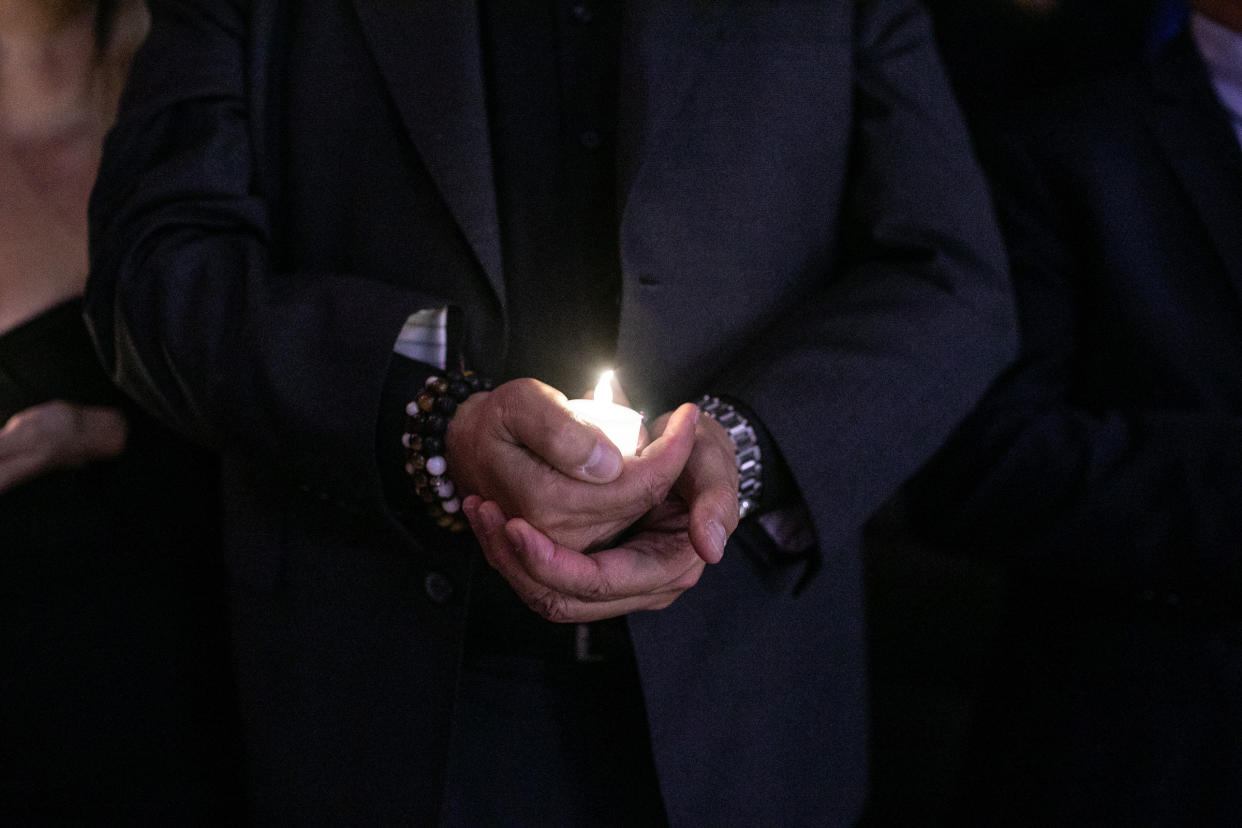 Family, friends and community members gather at a candlelight vigil in Valencia, Calif., for loved ones who died from a fentanyl overdose on March 13, 2023.