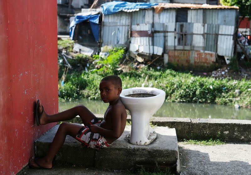 A kid is pictured in Cidade de Deus slum during the coronavirus disease (COVID-19) outbreak in Rio de Janeiro