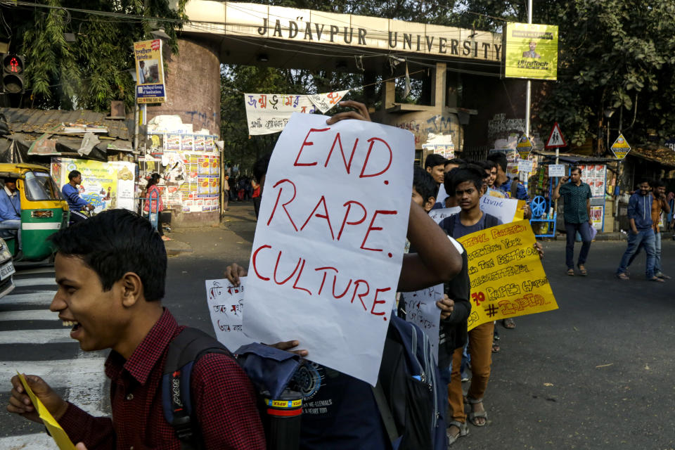University students shout slogans demanding justice in the case of a veterinarian who was gang-raped and killed last week during a protest rally in Kolkata, India, Monday, Dec. 2, 2019. The burned body of the 27-year-old woman was found Thursday morning by a passer-by in an underpass in the southern city of Hyderabad after she went missing the previous night. (AP Photo/Bikas Das)