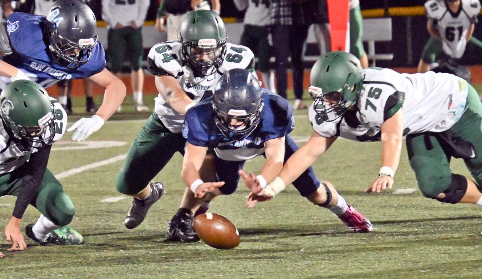 SANDWICH 9/23/22      Brady Carroll of Sandwich and Aidan Powers of Abington dive for a fumble at Carroll recovered.