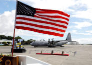 A U.S. flag flutters during a ceremony marking the return of the bells of Balangiga at Villamor Air Base in Pasay, Metro Manila, Philippines December 11, 2018. REUTERS/Erik De Castro