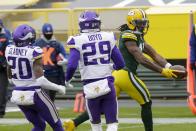 Green Bay Packers' Davante Adams catckes a touchdown pass during the first half of an NFL football game against the Minnesota Vikings Sunday, Nov. 1, 2020, in Green Bay, Wis. (AP Photo/Mike Roemer)
