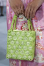 <p><i>Green beaded handbag from the SS18 Shrimps collection. (Photo: ImaxTree) </i></p>