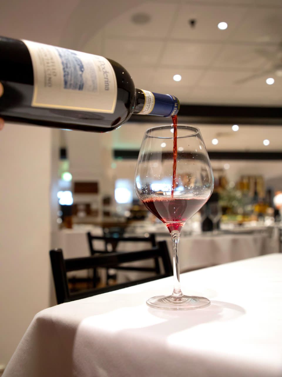 Machiavelli's Sommelier Simone hand picks wine to go with your meal. Photo: Machiavelli