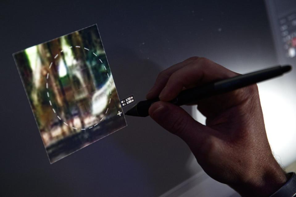 A computer forensic analyst reviews a case inside the Victim Identification Lab, part of Homeland Security's Child Exploitation Investigations Unit, in Fairfax, Va., Friday, Nov. 22, 2019. The Homeland Security Investigations section's little-known Child Exploitation Investigations lab is where agents scour disturbing photos and videos of child sexual abuse. They look for unlikely clues that help them identify the children and bring their abusers to justice. In one case, it was the loud, persistent chirping of a bird. Another time, it was unusual playground equipment. (AP Photo/Jacquelyn Martin)