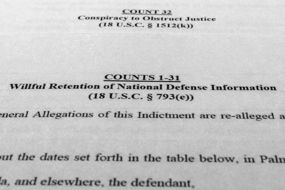 The indictment against former President Donald Trump is photographed on Friday, June 9, 2023. Trump is facing 37 felony charges related to the mishandling of classified documents according to the unsealed indictment that also alleges that he improperly shared a Pentagon "plan of attack" and a classified map related to a military operation.(AP Photo/Jon Elswick)