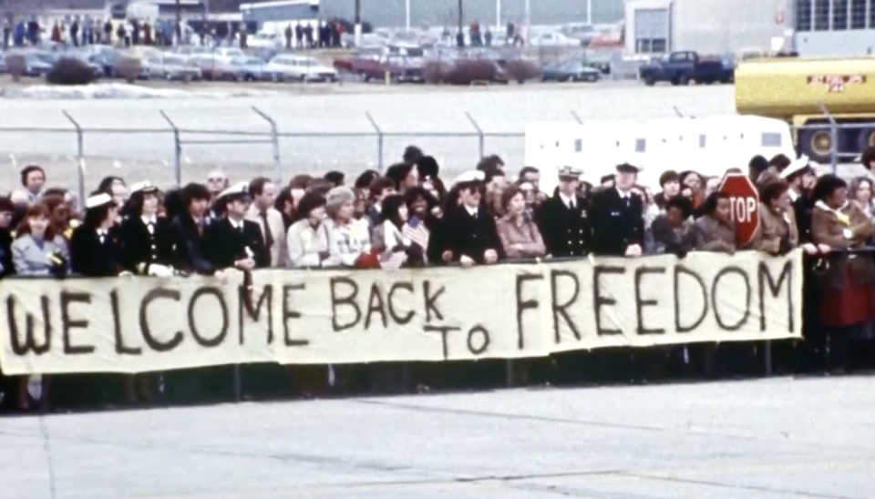 Families of those held hostage in Iran greet them on the tarmac in Germany in 1981. / Credit: CBS Saturday Morning