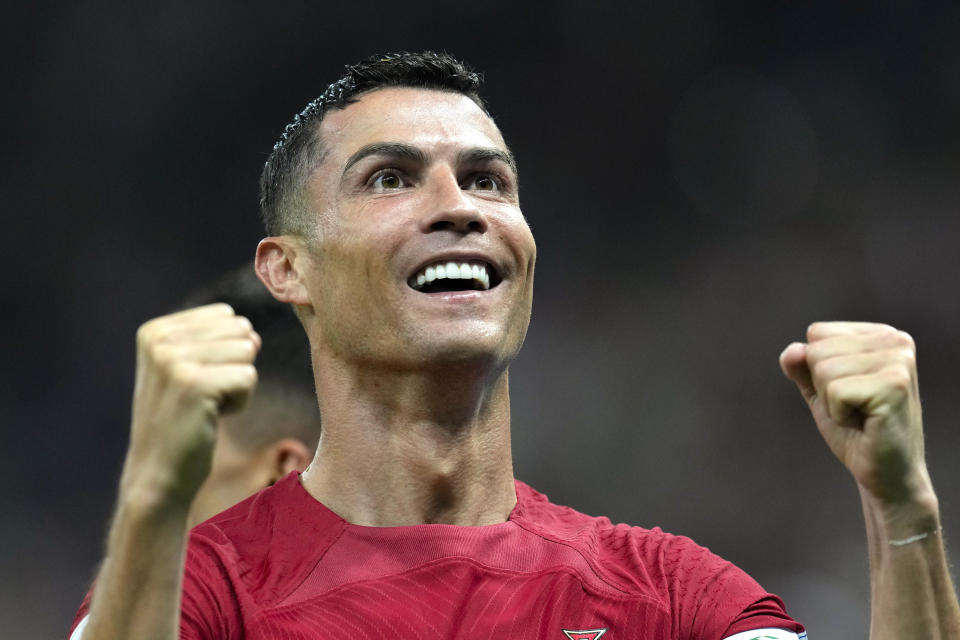 Portugal's Cristiano Ronaldo celebrates after scoring his side's opening goal during the World Cup group H soccer match between Portugal and Uruguay, at the Lusail Stadium in Lusail, Qatar, Monday, Nov. 28, 2022. (AP Photo/Themba Hadebe)