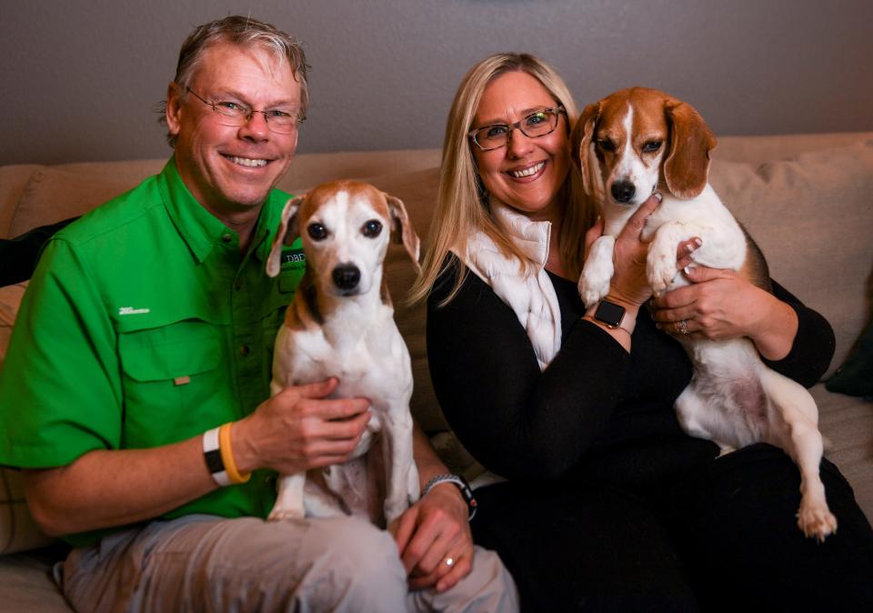 Greg and Denise Patton pose for a portrait with their bedbug detection beagles, Bo and B.G., on Wednesday, Jan. 8, 2020 in Sioux Falls. The couple started Dakota Bedbug Detection in 2011 and use their certified beagles to sniff out bedbugs.
