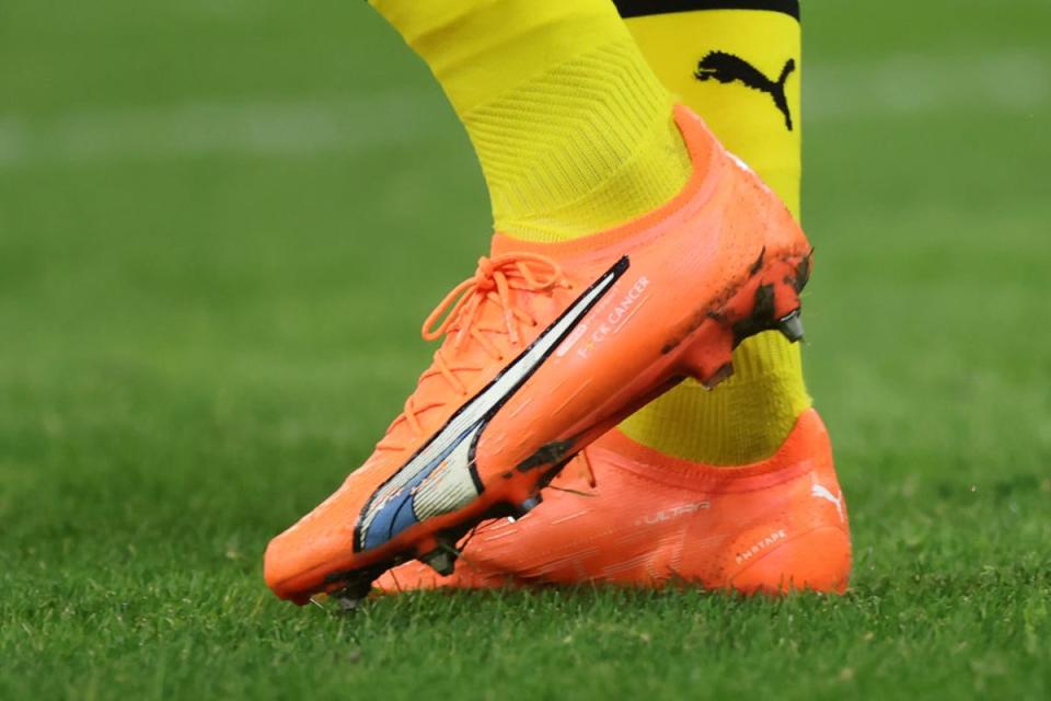 Haller’s boots with “F*** cancer” on them (Getty Images)