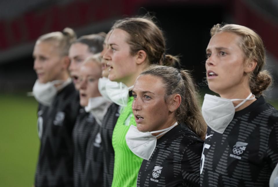 FILE - In this July 21, 2021, file photo, New Zealand players sing the national anthem before the start a women's soccer match against Australia at the 2020 Summer Olympics, in Tokyo. (AP Photo/Ricardo Mazalan, File)