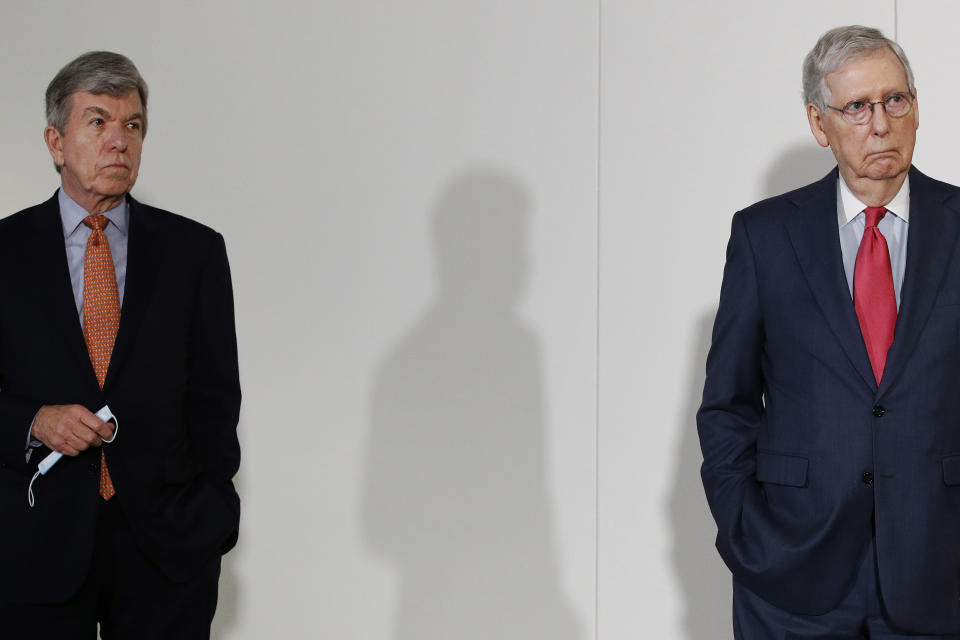 Sen. Roy Blunt, R-Mo., left, and Senate Majority Leader Mitch McConnell of Ky., maintain social distancing as they attend a press conference after meeting with Senate Republicans at their weekly luncheon on Capitol Hill in Washington, Tuesday, May 19, 2020. (AP Photo/Patrick Semansky)