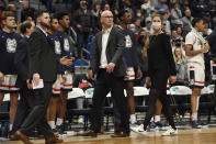 Connecticut coach Dan Hurley walks off the court after being ejected during the first half of the team's NCAA college basketball game against Villanova, Tuesday, Feb. 22, 2022, in Hartford, Conn. (AP Photo/Jessica Hill)