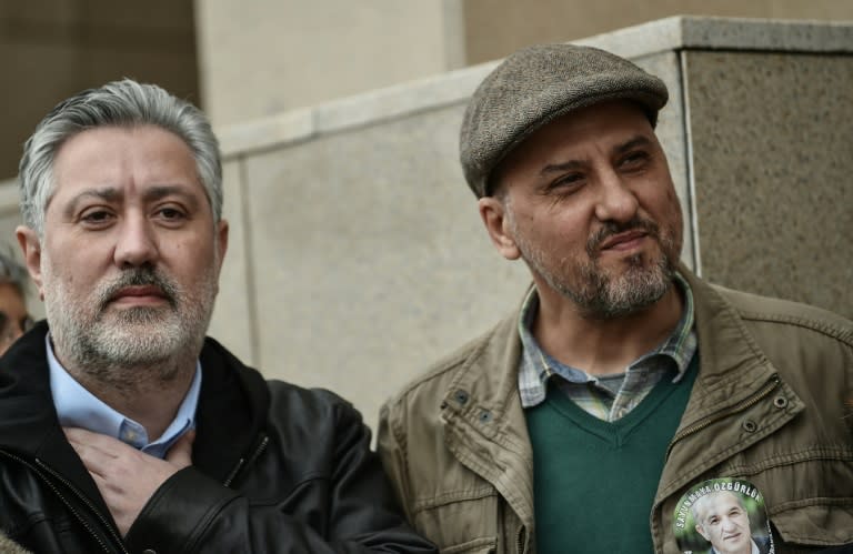 Cumhuriyet's editor-in-chief Murat Sabuncu (L), pictured in March 2018, was among those convicted