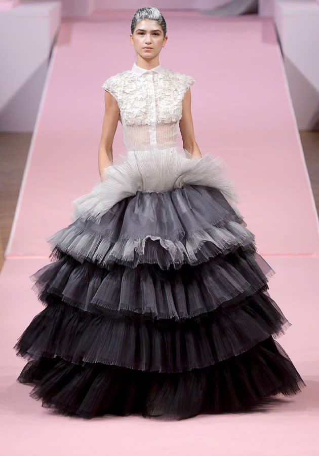 <b>Alexis Mabille Haute Couture SS13</b> <br><br>A tiered, ball gown in shades of grey and black highlighted the futuristic make up.<br><br>© Rex