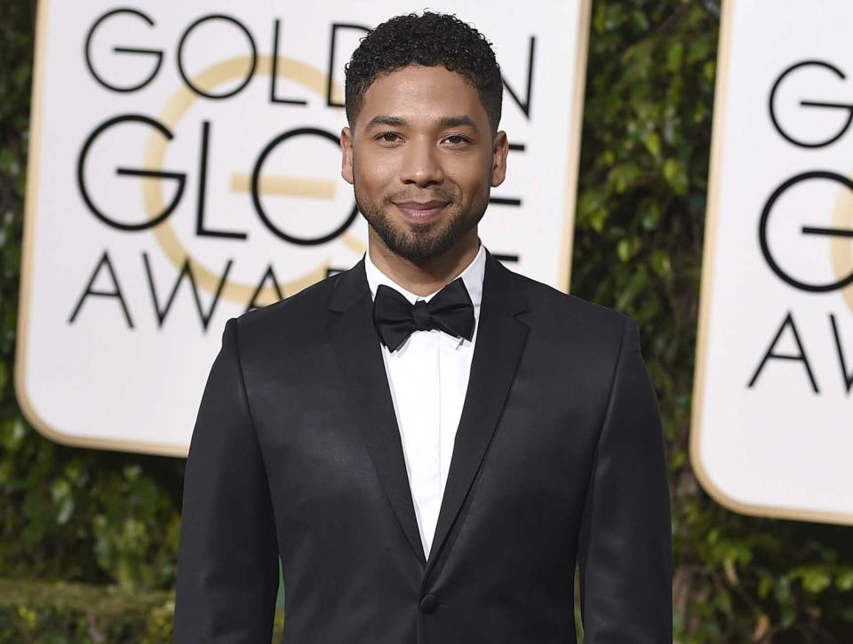 FILE - In this Jan. 10, 2016 file photo, actor and singer Jussie Smollett arrives at the 73rd annual Golden Globe Awards in Beverly Hills, Calif. Smollett, who alleges he was the victim of a brutal racial and homophobic attack, is a former child star who grew up to become a champion of LGBT rights and one of the few actors to play a black gay character on primetime TV. His breakthrough came aboard the hip-hop drama “Empire,” playing Jamal Lyon, a talented R&B singer struggling to earn his father’s approval and find his place in his dad's music empire. It became one of the biggest network shows to star a gay black character. (Photo by Jordan Strauss/Invision/AP, File)