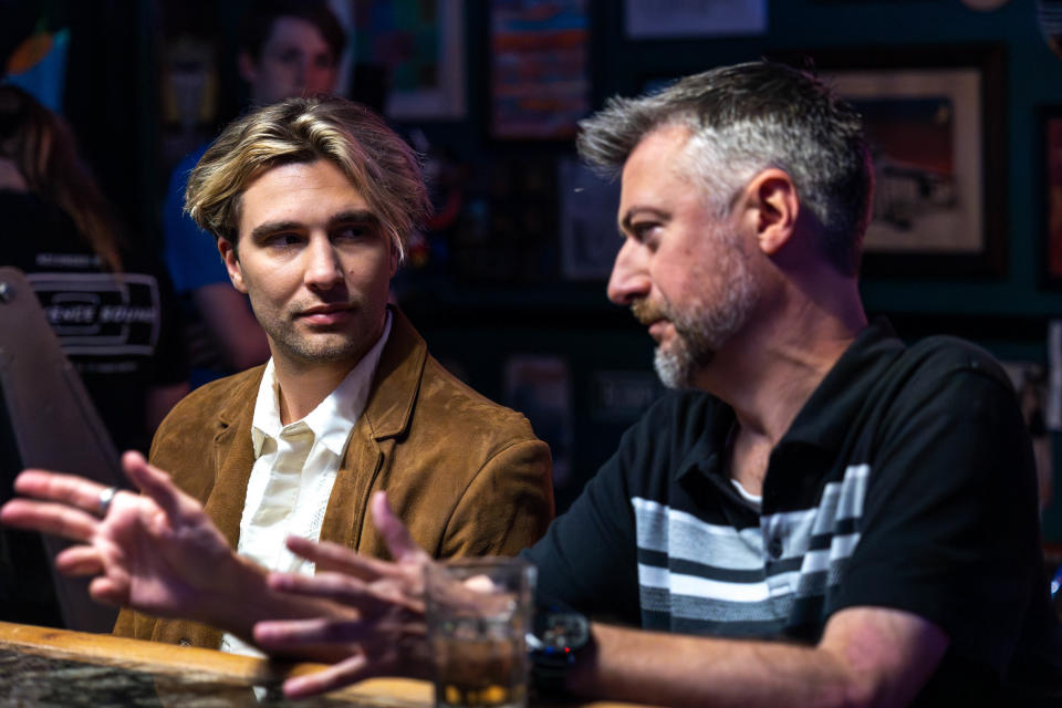 Actor Sean Gunn performs a scene with actor Grayson Dunn on the set of "Defiant Vanity" during filming at Cookies on Western in Oklahoma City on Friday, June 30, 2023.