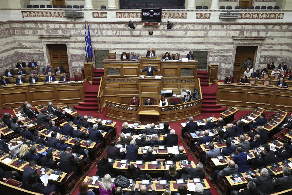 Greece's Prime Minister Alexis Tsipras delivers his speech during a parliament debate about Prespa Agreement in Athens, Thursday, Jan. 24, 2019. Greek lawmakers are debating a historic agreement aimed at normalizing relations with Macedonia in a stormy parliamentary session scheduled to culminate in a Friday vote. (AP Photo/Yorgos Karahalis)