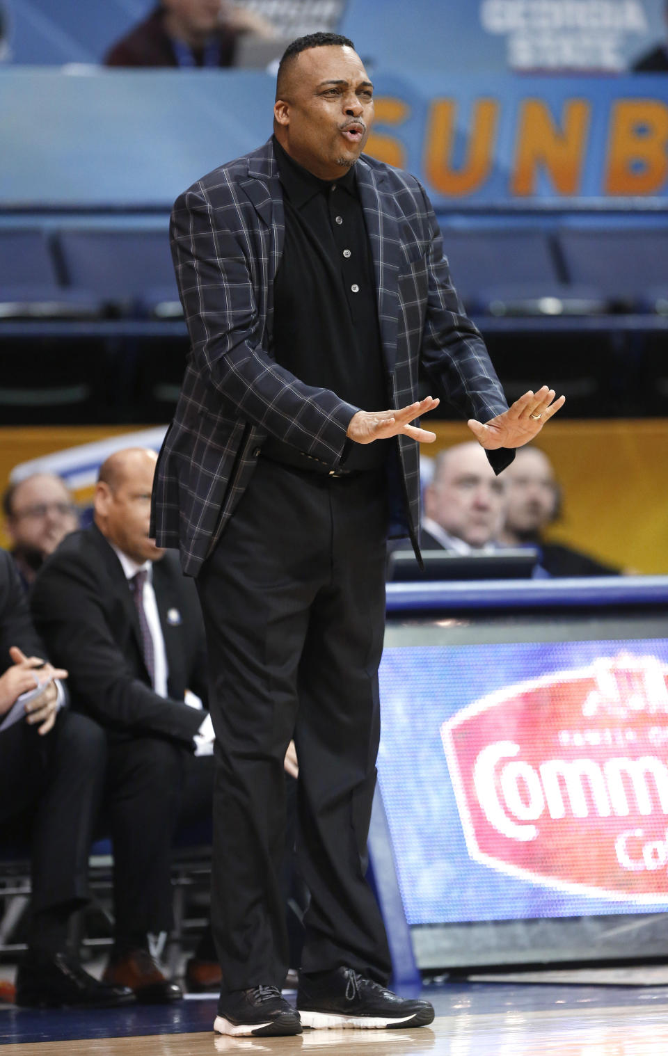 Georgia State coach Ron Hunter reacts to a call during the first half of the team's NCAA college basketball game against Texas-Arlington for the championship of the Sun Belt Conference men's tournament in New Orleans, Sunday, March 17, 2019. Georgia State won 73-64. (AP Photo/Tyler Kaufman)