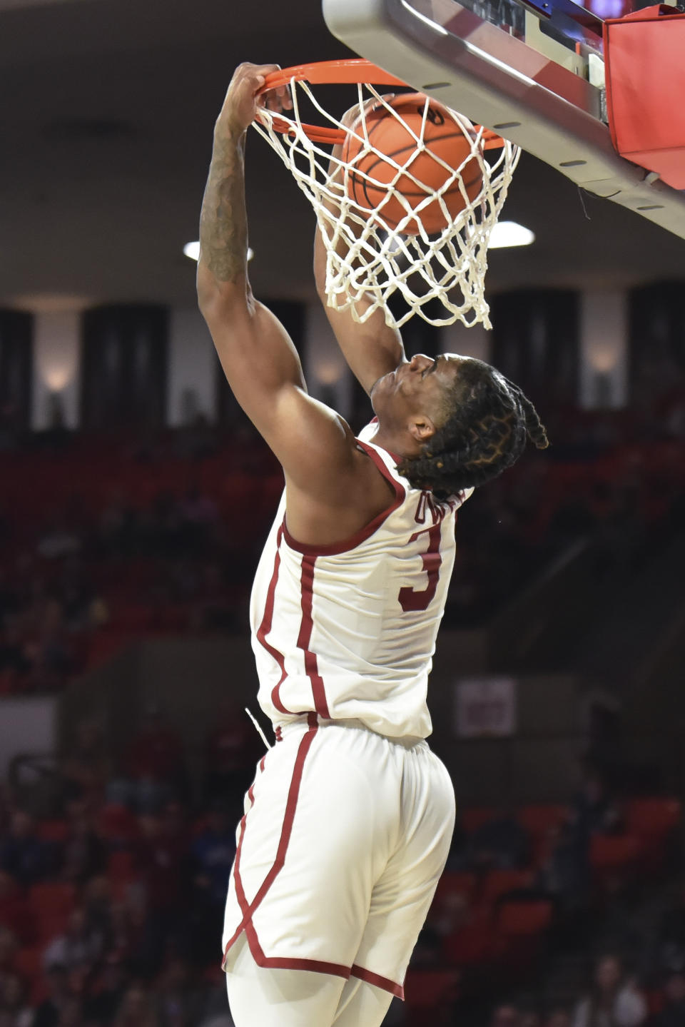 Oklahoma guard Otega Oweh dunks against Green Bay during the first half of an NCAA college basketball game Saturday, Dec. 16, 2023, in Norman, Okla. (AP Photo/Kyle Phillips)