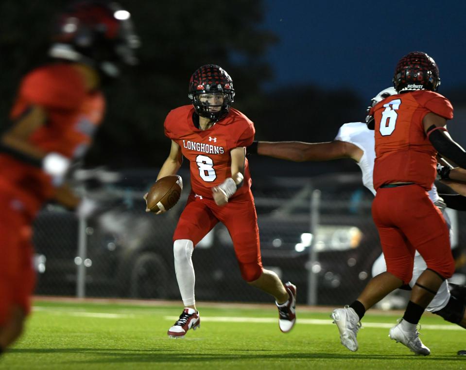 Lockney's Dyllan Thiebaud runs with the ball against Ralls in a District 3-2A Division II high school football game, Friday, Oct. 20, 2023, at Mitchell Zimmerman Field in Lockney.