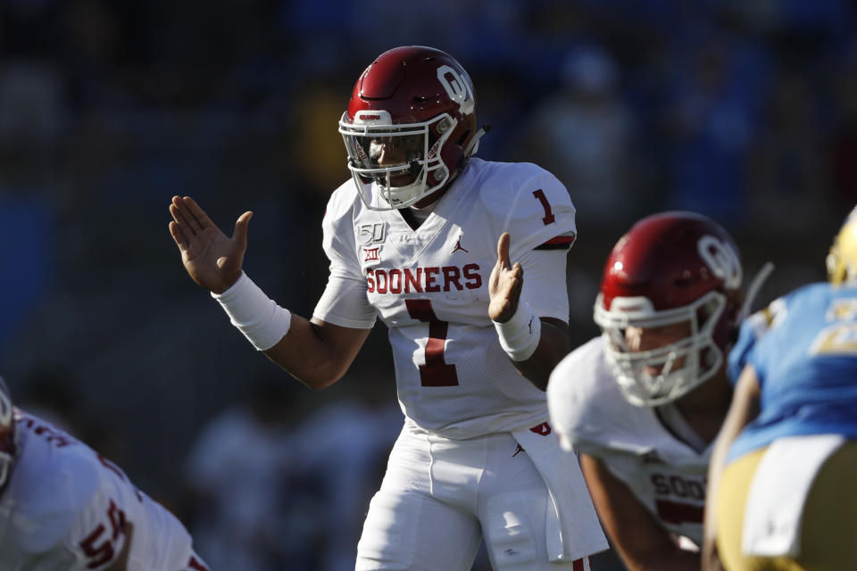 LOS ANGELES, CALIFORNIA - SEPTEMBER 14:  Jalen Hurts #1 of the Oklahoma Sooners calls a play during the first half of a game against the UCLA Bruins on at the Rose Bowl on September 14, 2019 in Los Angeles, California. (Photo by Sean M. Haffey/Getty Images)