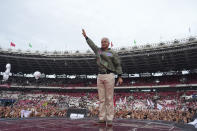 Presidential candidate Ganjar Pranowo gestures during his campaign rally at Gelora Bung Karno Main Stadium in Jakarta, Indonesia, Saturday, Feb. 3, 2024. The world's third-largest democracy is scheduled to hold its parliamentary and presidential elections on Feb. 14. (AP Photo/Achmad Ibrahim)