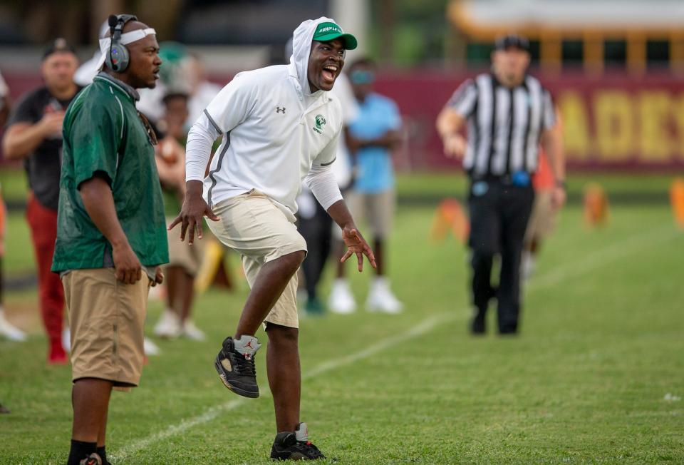 Atlantic head coach Jamael Stewart encourages his players during their game against Glades Central in September 2021.