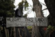 A protest sign is seen outside a trailer home in Village Trailer Park in Santa Monica, July 12, 2012.