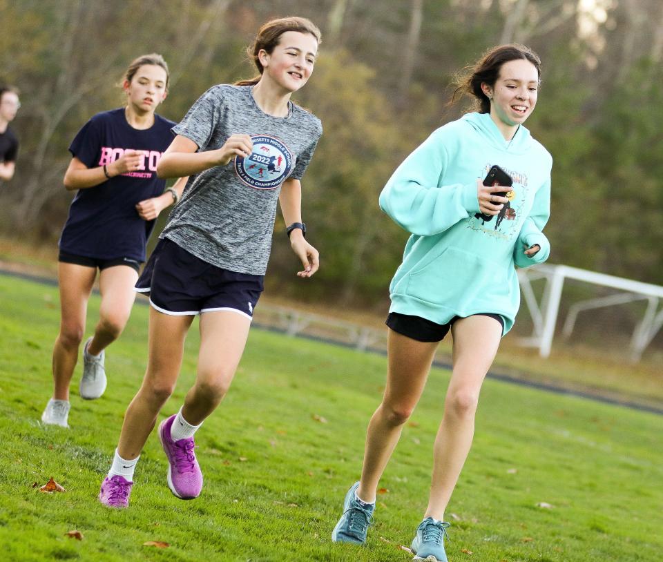 Abington's Vangie McCleary, left, and Selena Wood running at practice.